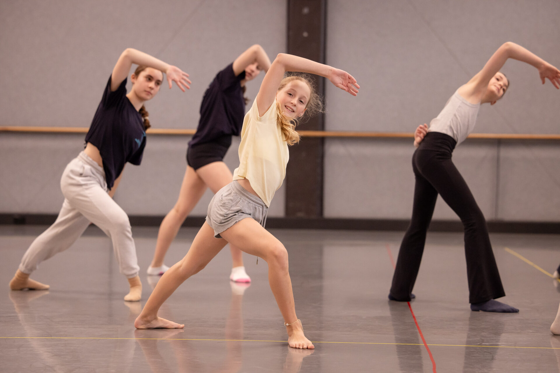 Junior Youth Ensemble dancers taking contemporary class at Sydney Dance Company studios.