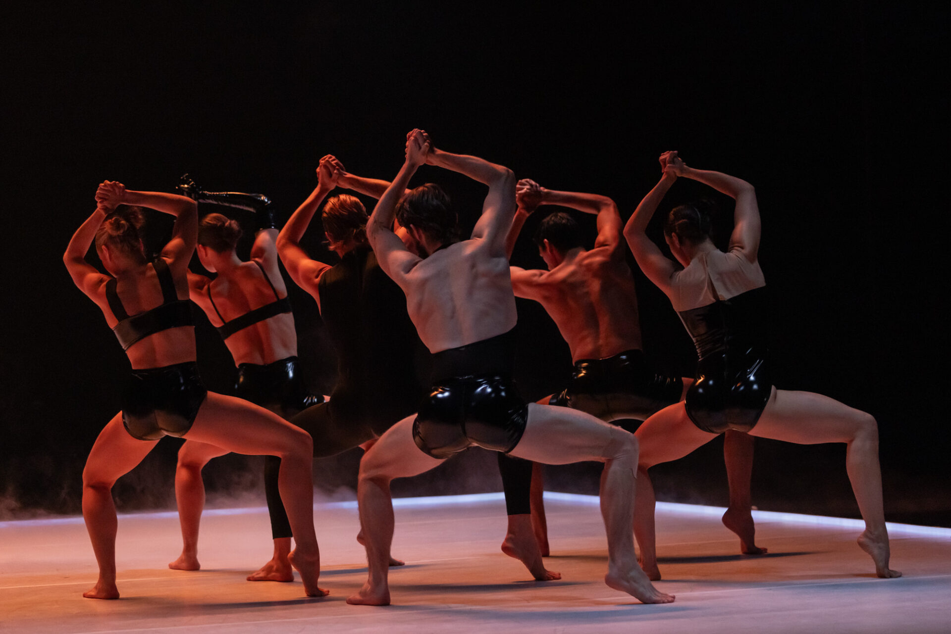 Sydney Dance Company performs Melanie Lane's 'Love Lock' on stage.