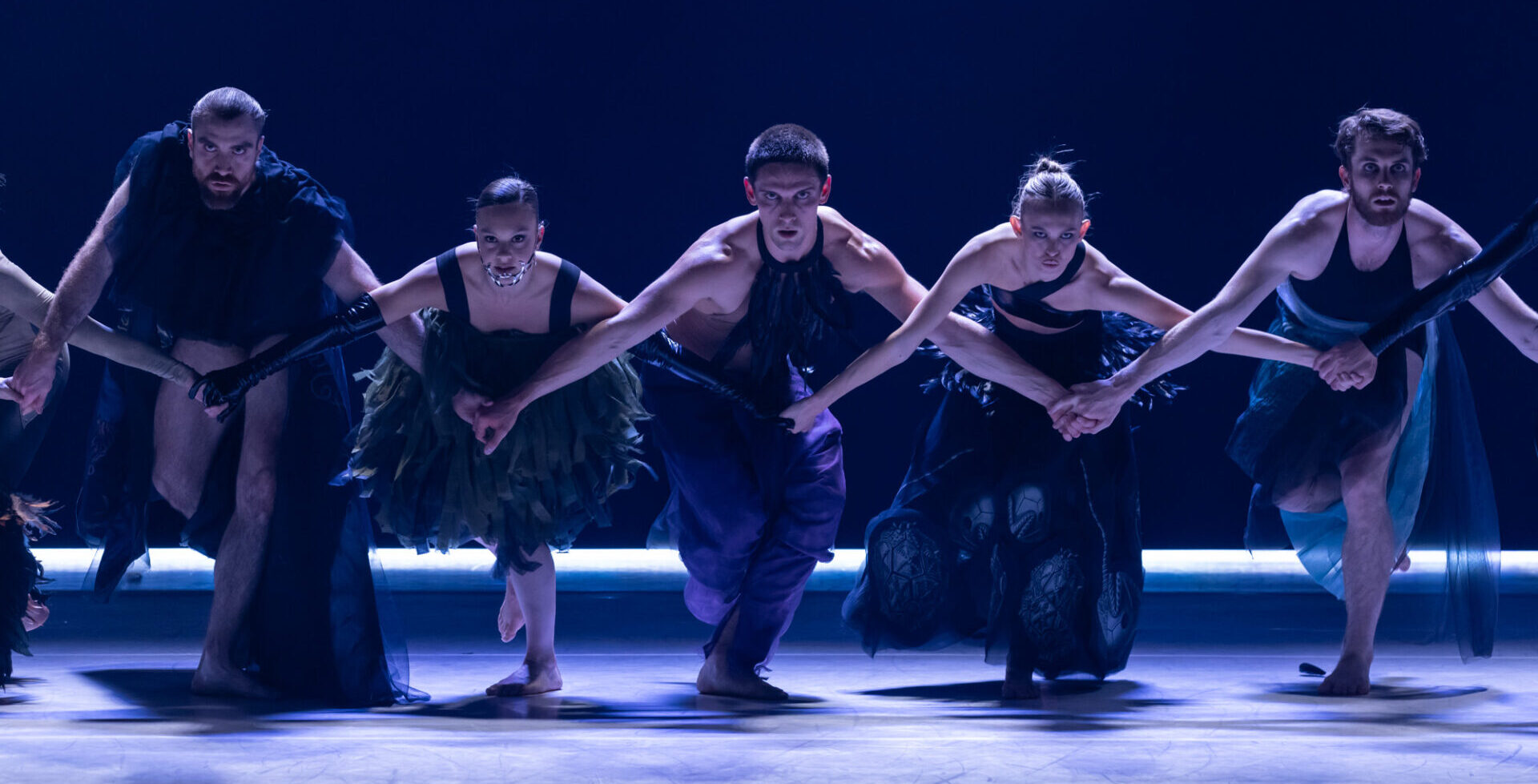 Sydney Dance Company performs Melanie Lane's 'Love Lock' on stage.