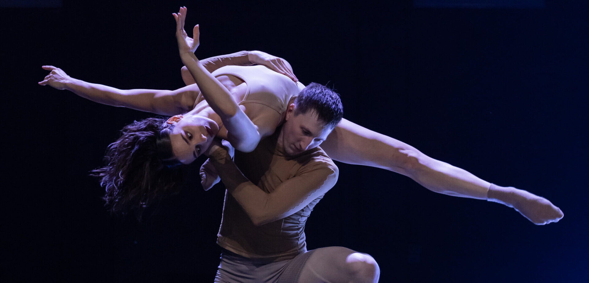 Two dancers onstage in Rafael Bonachela's momenta.